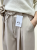 Spodnie materiałowe beżowe z wiskozy szeroka nogawka eleganckie_4.png